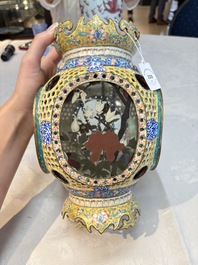 A very rare pair of Chinese Canton enamel lanterns with reverse painted glass panels, Qianlong