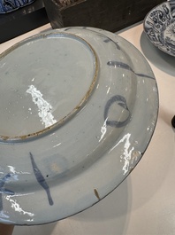 Three blue and white Dutch Delft chinoiserie dishes, late 17th C.