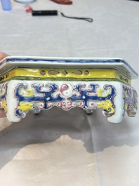 A Chinese famille rose hexagonal stand with antiquities, Yongzheng/Qianlong