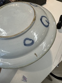Three blue and white Dutch Delft chinoiserie dishes, late 17th C.