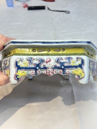 A Chinese famille rose hexagonal stand with antiquities, Yongzheng/Qianlong