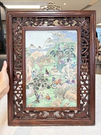A Chinese famille rose 'gathering of sages' plaque, mounted in a wooden frame, Republic
