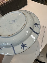 Three blue and white Dutch Delft chinoiserie dishes, late 17th C.