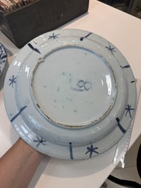 Three blue and white Dutch Delft chinoiserie dishes, late 17th C.