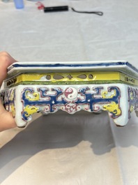A Chinese famille rose hexagonal stand with antiquities, Yongzheng/Qianlong