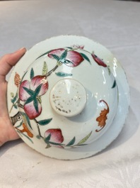 A Chinese famille rose 'nine peaches' vase and cover, 19th C.