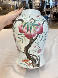 A Chinese famille rose 'nine peaches' vase and cover, 19th C.