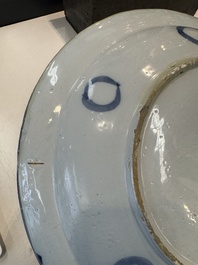 Three blue and white Dutch Delft chinoiserie dishes, late 17th C.