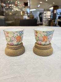 A pair of Chinese famille rose 'millefleurs' cups with a presentation box, Jiaqing mark, Republic