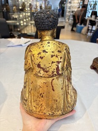A set of three Chinese or Vietnamese gilt-lacquered wooden sculptures of Buddha, 18/19th C.