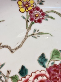 A Chinese famille rose 'peonies and plum blossoms' dish, Yongzheng