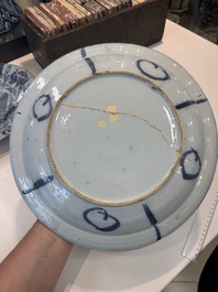 Three blue and white Dutch Delft chinoiserie dishes, late 17th C.