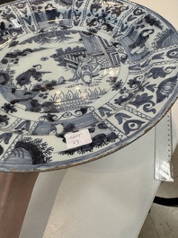 Three blue and white Dutch Delft chinoiserie dishes, late 17th C.