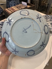Three blue and white Dutch Delft chinoiserie dishes, late 17th C.