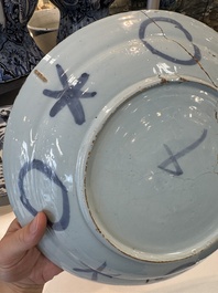 Three blue and white Dutch Delft chinoiserie dishes, late 17th C.