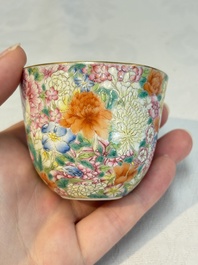 A pair of Chinese famille rose 'millefleurs' cups with a presentation box, Jiaqing mark, Republic
