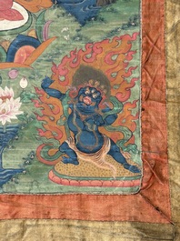 A Tibetan thangka depicting Green Tara, 19th C.