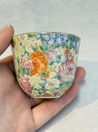 A pair of Chinese famille rose 'millefleurs' cups with a presentation box, Jiaqing mark, Republic