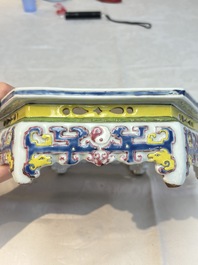 A Chinese famille rose hexagonal stand with antiquities, Yongzheng/Qianlong