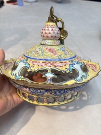 A very rare pair of Chinese Canton enamel lanterns with reverse painted glass panels, Qianlong