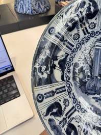 Three blue and white Dutch Delft chinoiserie dishes, late 17th C.