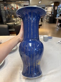 A pair of Chinese gilt-decorated powder-blue 'yenyen' vases, Kangxi