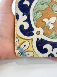 A rare polychrome Dutch Delft maiolica 'nier' or 'kidney' ornament tile, late 16th C.