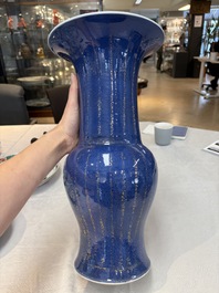 A pair of Chinese gilt-decorated powder-blue 'yenyen' vases, Kangxi