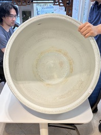 A massive Chinese blue and white 'lotus scroll' fish bowl, Qianlong/Jiaqing