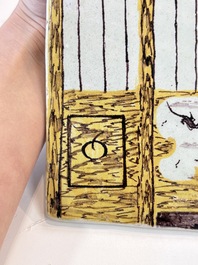 A polychrome Dutch Delft 'bird cage' plaque, 18th C.