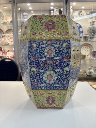 A Chinese famille rose blue and yellow-ground hexagonal garden seat, 19th C.