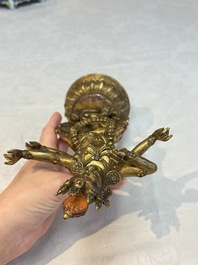 A Nepalese or Tibetan turquoise-inlaid gilt-bronze sculpture of Kurukulla or Red Tara, 15th C. or later