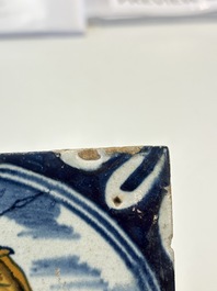 A polychrome Dutch Delft maiolica 'soldier' ​​medallion tile, late 16th C.