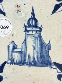 Two blue and white Dutch Delft 'castle' and 'soldier with coloured flame' tiles, 17th C.