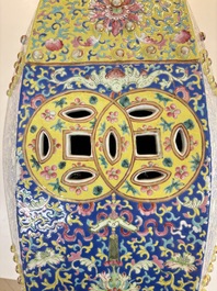 A Chinese famille rose blue and yellow-ground hexagonal garden seat, 19th C.