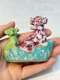 A Chinese famille rose 'mandarin' group and a 'qilin' water dropper, Qianlong