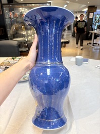 A pair of Chinese gilt-decorated powder-blue 'yenyen' vases, Kangxi