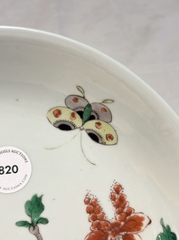 A Chinese famille verte 'peonies and butterflies' plate, Kangxi