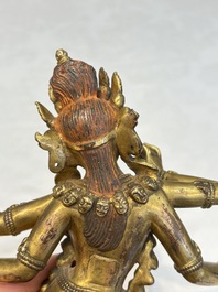 A Nepalese or Tibetan turquoise-inlaid gilt-bronze sculpture of Kurukulla or Red Tara, 15th C. or later
