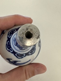 A blue and white Dutch Delft vase with silver cover, 18th C.