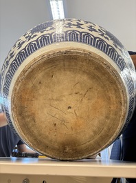 A massive Chinese blue and white 'lotus scroll' fish bowl, Qianlong/Jiaqing