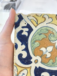 A rare polychrome Dutch Delft maiolica 'nier' or 'kidney' ornament tile, late 16th C.