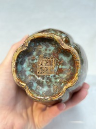 A Chinese celadon-glazed vase and a faux bronze-glazed vase, Qianlong mark, 18/19th C.