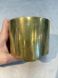 A Chinese bronze cylindrical tripod censer, Xuande mark, 18th C.