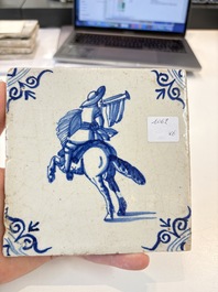 Six blue and white Dutch Delft 'figure' tiles , 17th C.