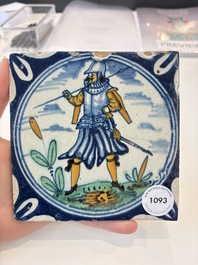 A polychrome Dutch Delft maiolica 'soldier' ​​medallion tile, late 16th C.