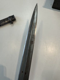 A Caucasian walrus bone-hilted kindjal with niello silver mounts, 19th C.