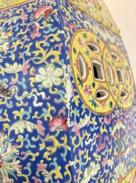 A Chinese famille rose blue and yellow-ground hexagonal garden seat, 19th C.