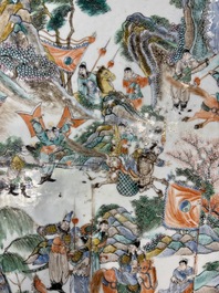 A Chinese mother-of-pearl-inlaid hongmu table with a circular Canton famille verte 'warriors on horseback' plaque, 19th C.