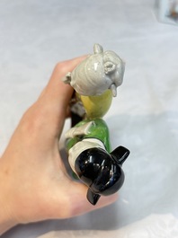 A Chinese famille rose 'mandarin' group and a 'qilin' water dropper, Qianlong